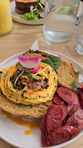 A plated brunch dish at Pilar Cafe & Eatery